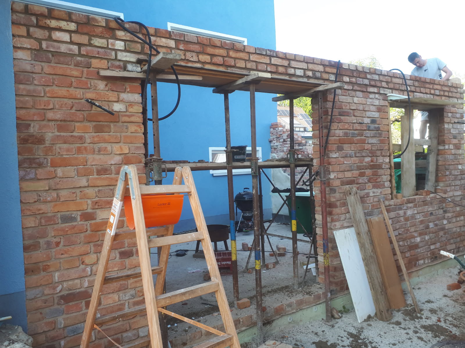 Neubau eines Wintergartens mit Sichtziegelmauerwerk